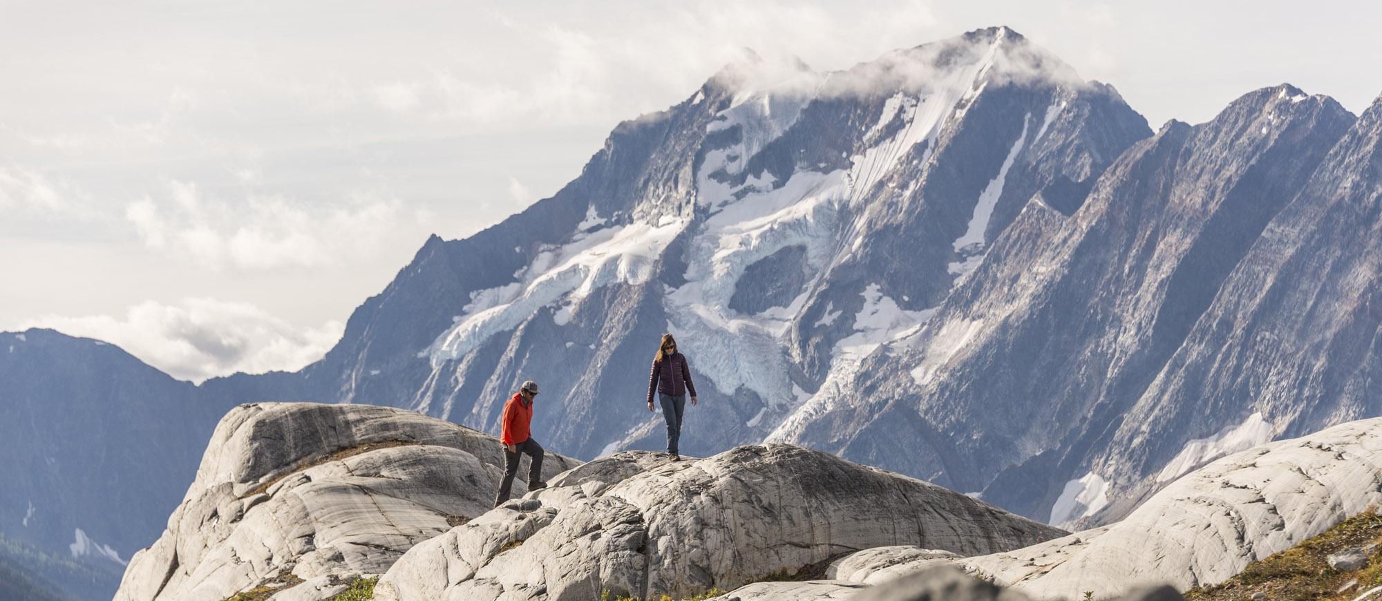 Two hikers at MacBeth Icefield in the Purcell Mountains near Nelson and Kaslo, BC.