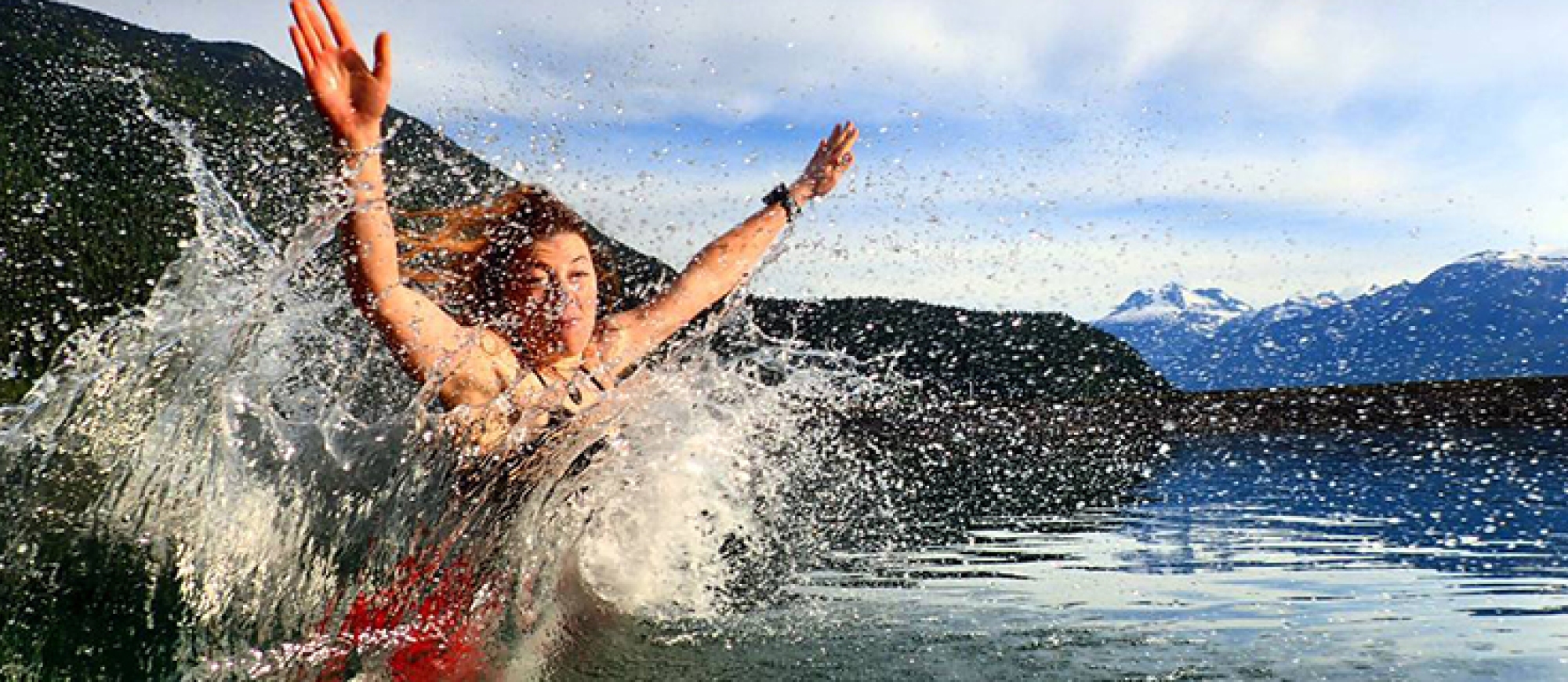 Girl splashing in Kootenay Lake.