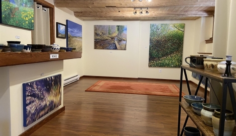 Inside of artist gallery with local paintings