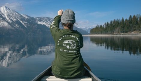 Person canoeing on Kootenay Lake.