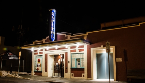 Capitol Theatre lit up at night in Nelson, BC