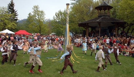 Kids doing the traditional May Pole dance during Kaslo May Days.