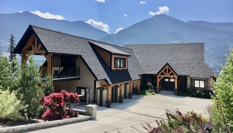 Kootenay wild guest suites with lake and mountains in the background
