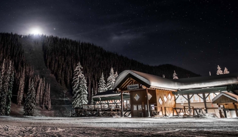 The stars and moonlight light up the Whitewater Ski Resort Lodge at night