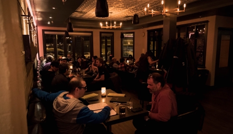 people dining in low lighting at Louie's Steakhouse