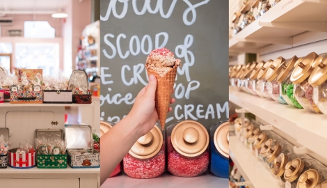 Inside of candy store and a hand holding an ice cream cone with sprinkles.