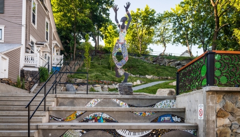 Dancing figure embellished with tile mosaic. 